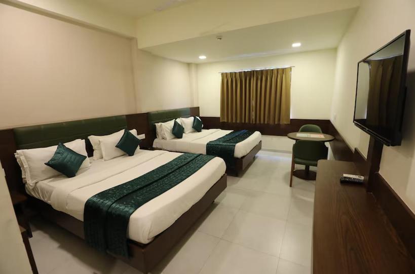 Greenotel Rooms Hazira, Surat Exterior photo